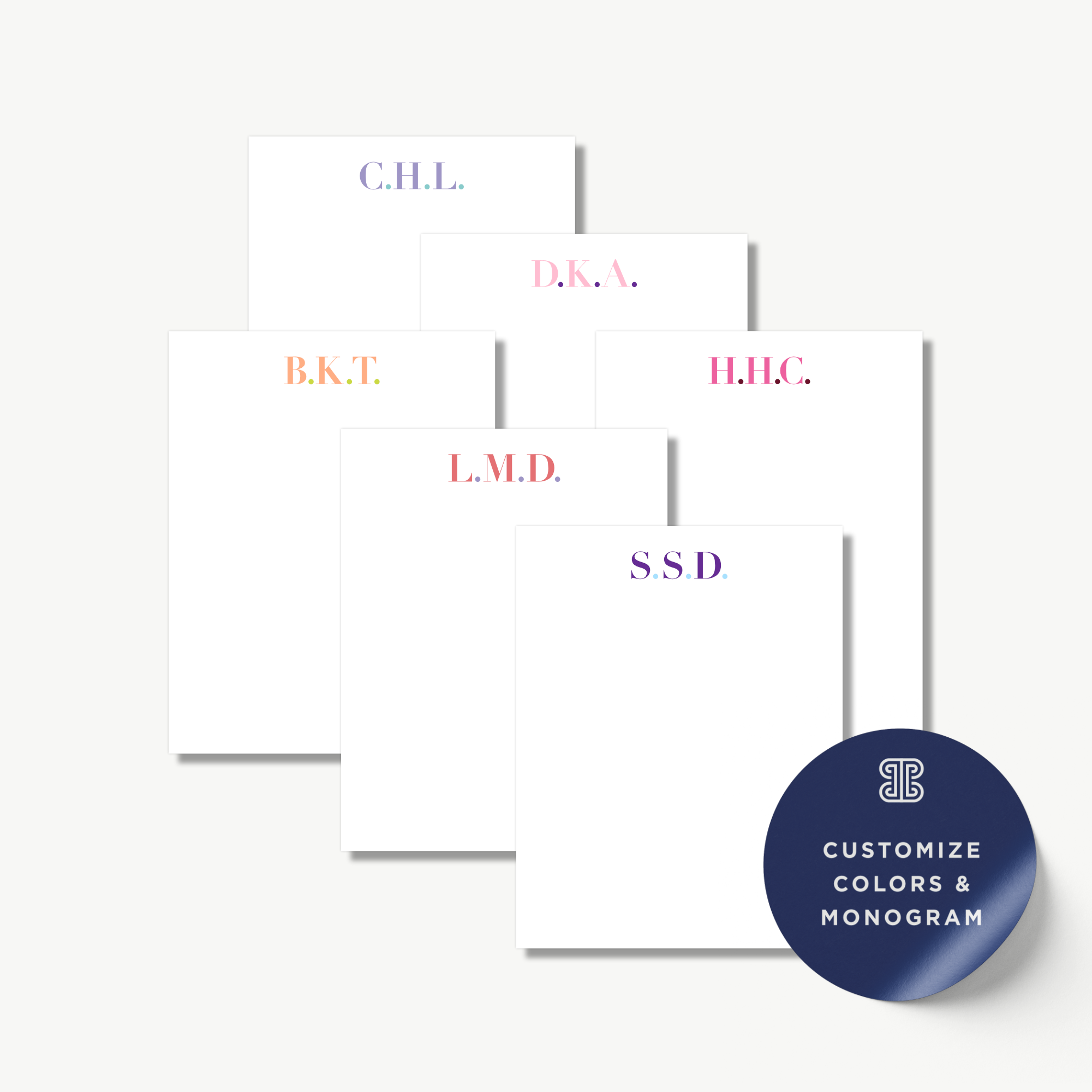 a collection of personalized stationery items, including name cards and blank notepads, each with a unique name printed on it.
