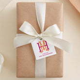 A brown gift box with a white ribbon and a tag that reads "A gift from THE MASTERSONS".