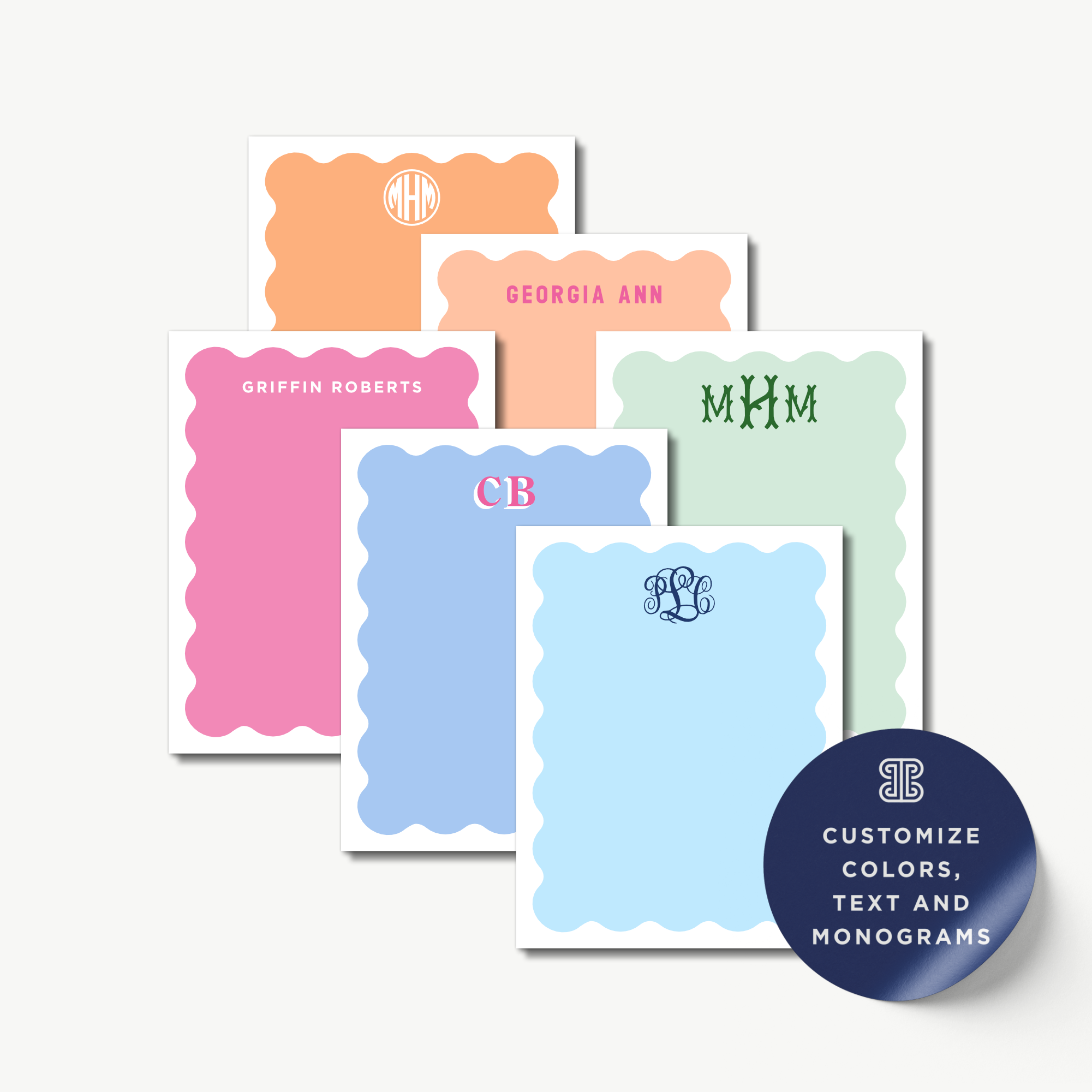 a collection of personalized notepads with scalloped edges and monogrammed initials, including names like "GRIFFIN ROBERTS" and "GEORGIA ANN". The notepads are available in various colors, such as pink, blue, and green, and are designed to be customized with text and monograms.