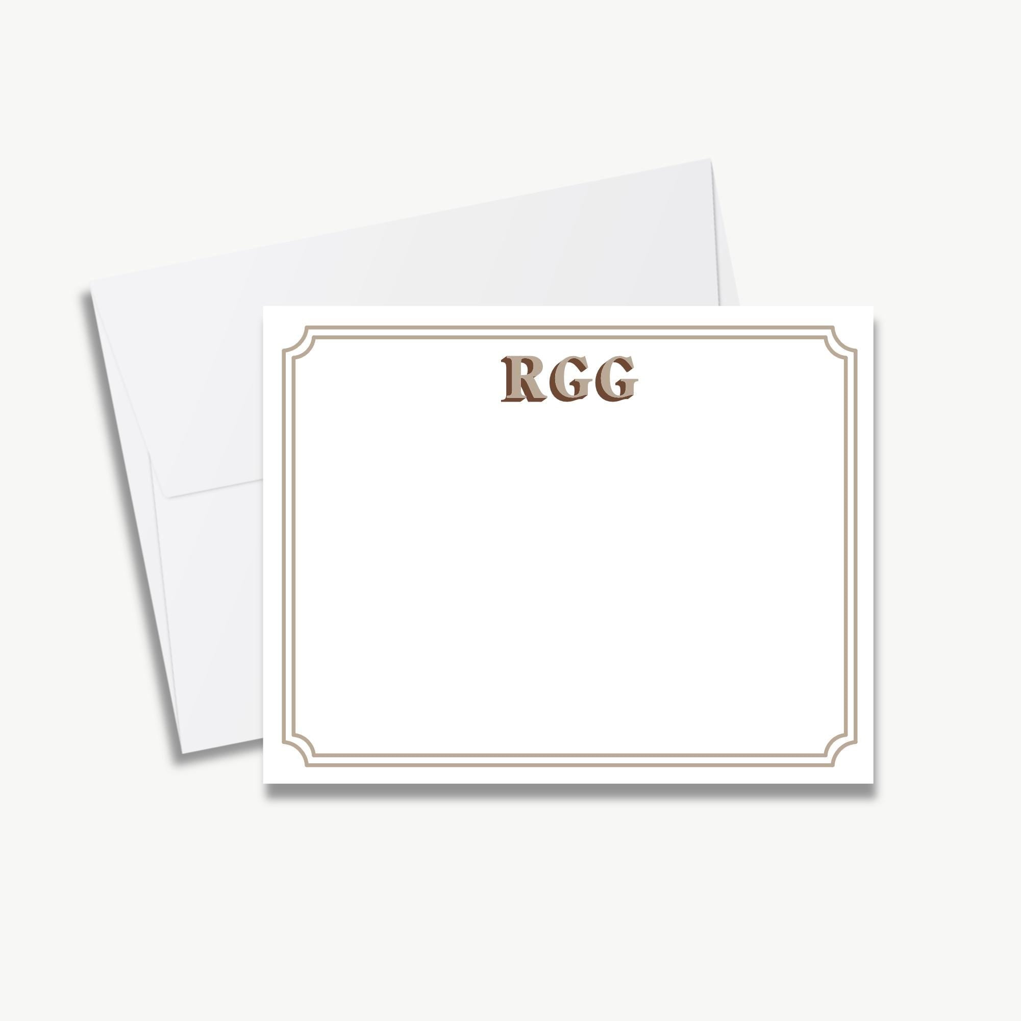 a blank card with a decorative border, placed on top of an envelope.