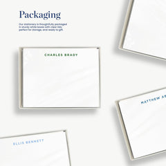 several blank white boxes with the names "CHARLES BRADY" and "MATTHEW ABBOTT" printed on them. The boxes are neatly packaged and appear to be ready for storage or gift-giving.