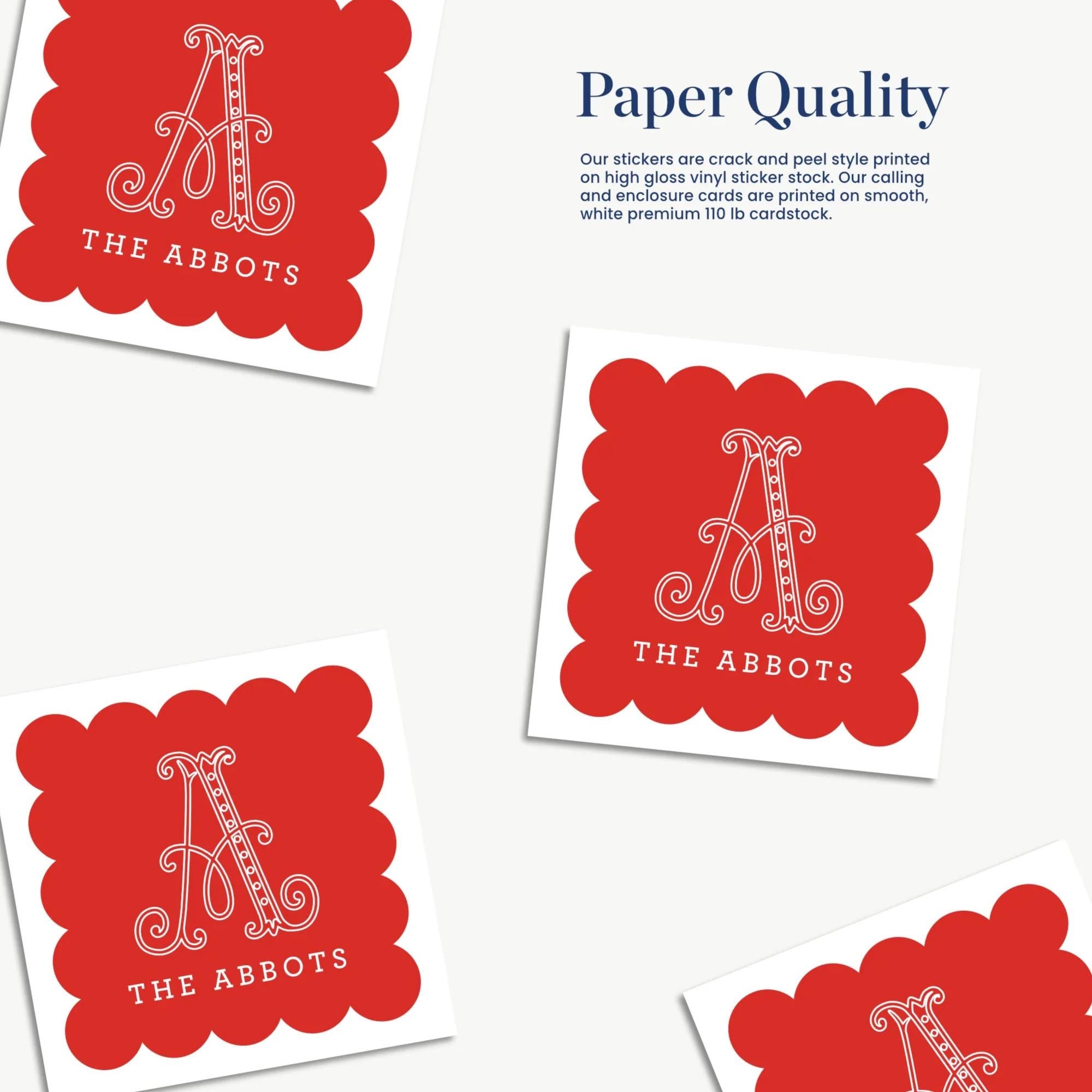 a collection of red stickers with the text "THE ABBOTS" printed on them.