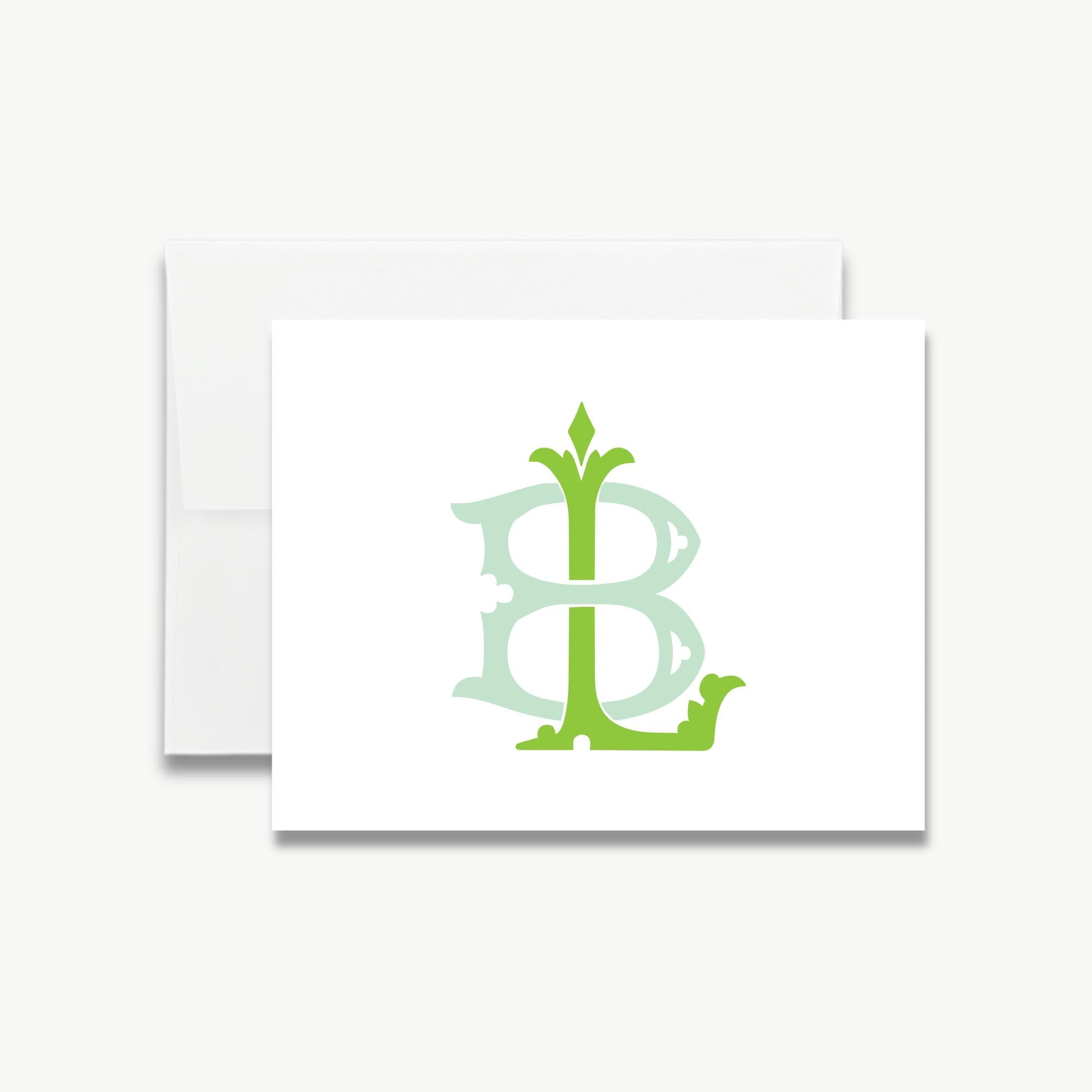 a white card with a green monogram consisting of the letters 'L' and 'B' in a stylized design.