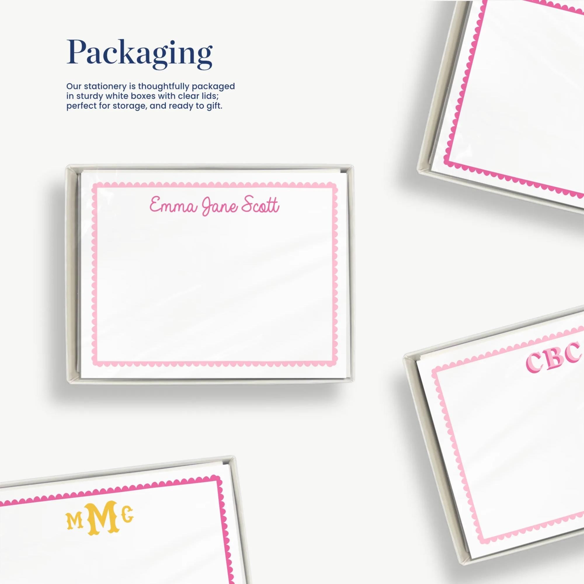 several pieces of paper or cards with personalized names and titles, such as "Emma Jane Scott" and "CCB", along with some text and logos. The image also includes a description of the packaging, which is thoughtfully packaged in sturdy white boxes with clear lids for easy storage and ready-to-give.