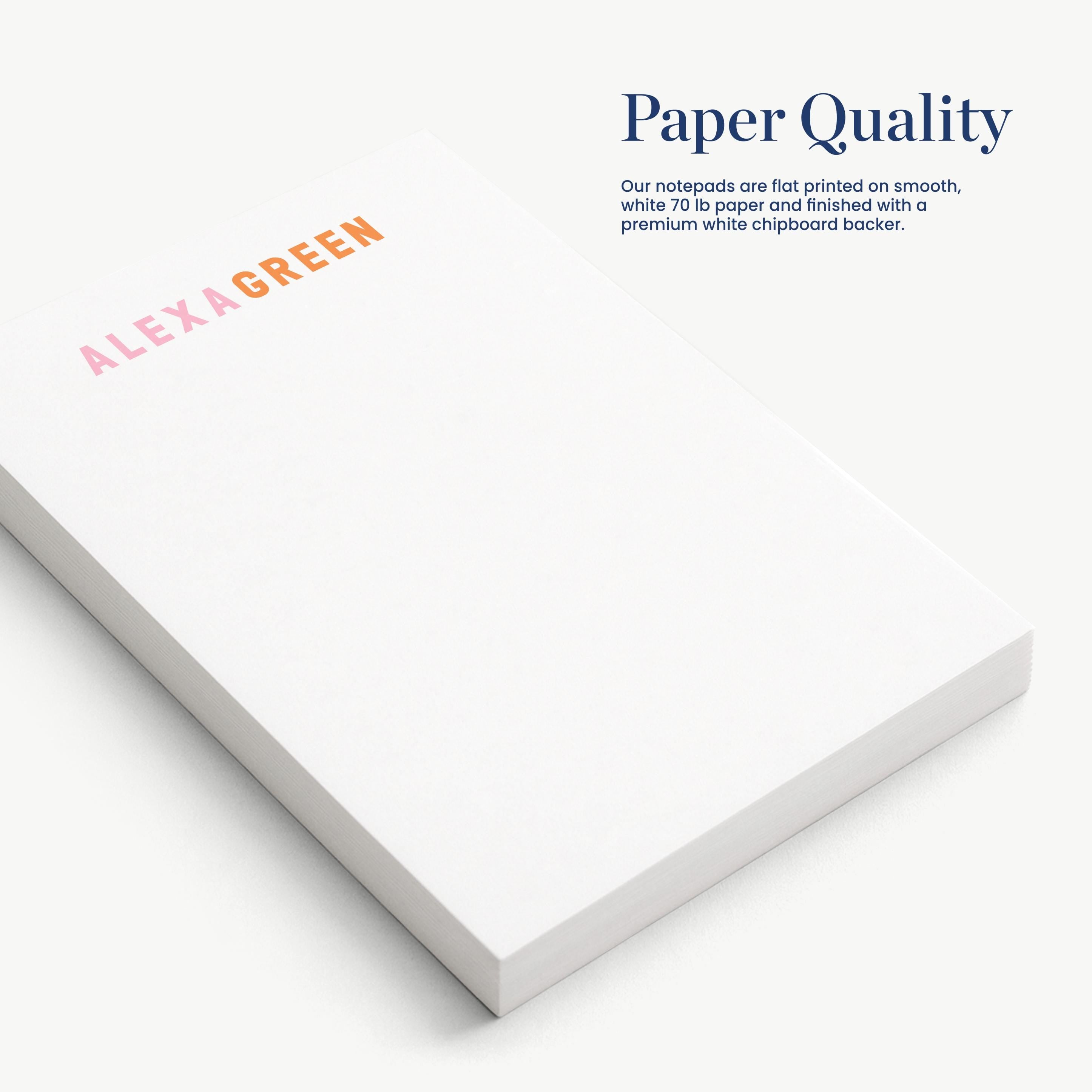 a close-up view of a white notepad with the text "Paper Quality" printed on it.