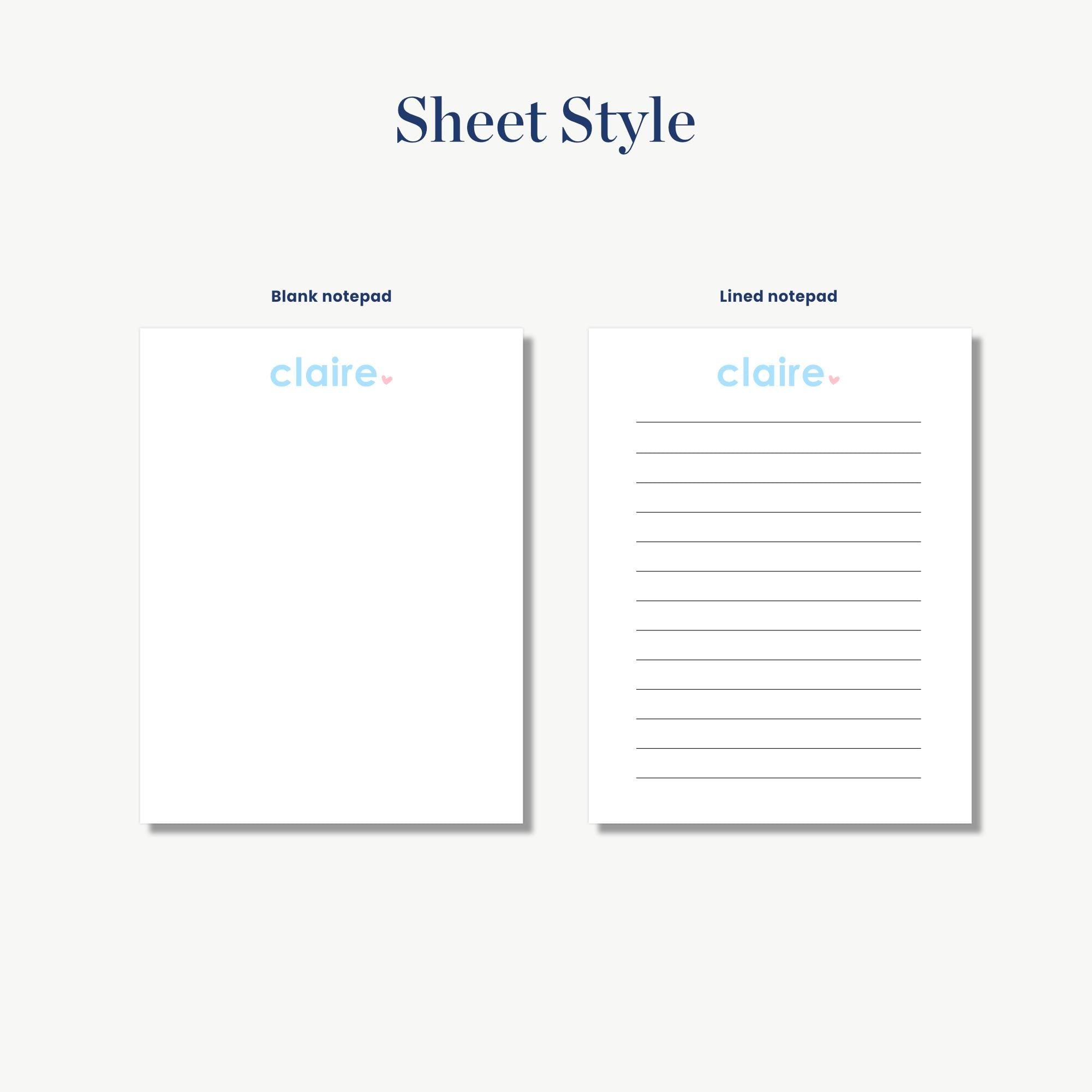 two blank notepads with the name 'claire' written on them.