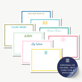 a collection of personalized name cards with various names and monogrammed initials, as well as a blue envelope with a personalized design.