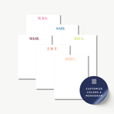a collection of six blank notepads with personalized monogrammed initials on them, arranged in a grid-like pattern.