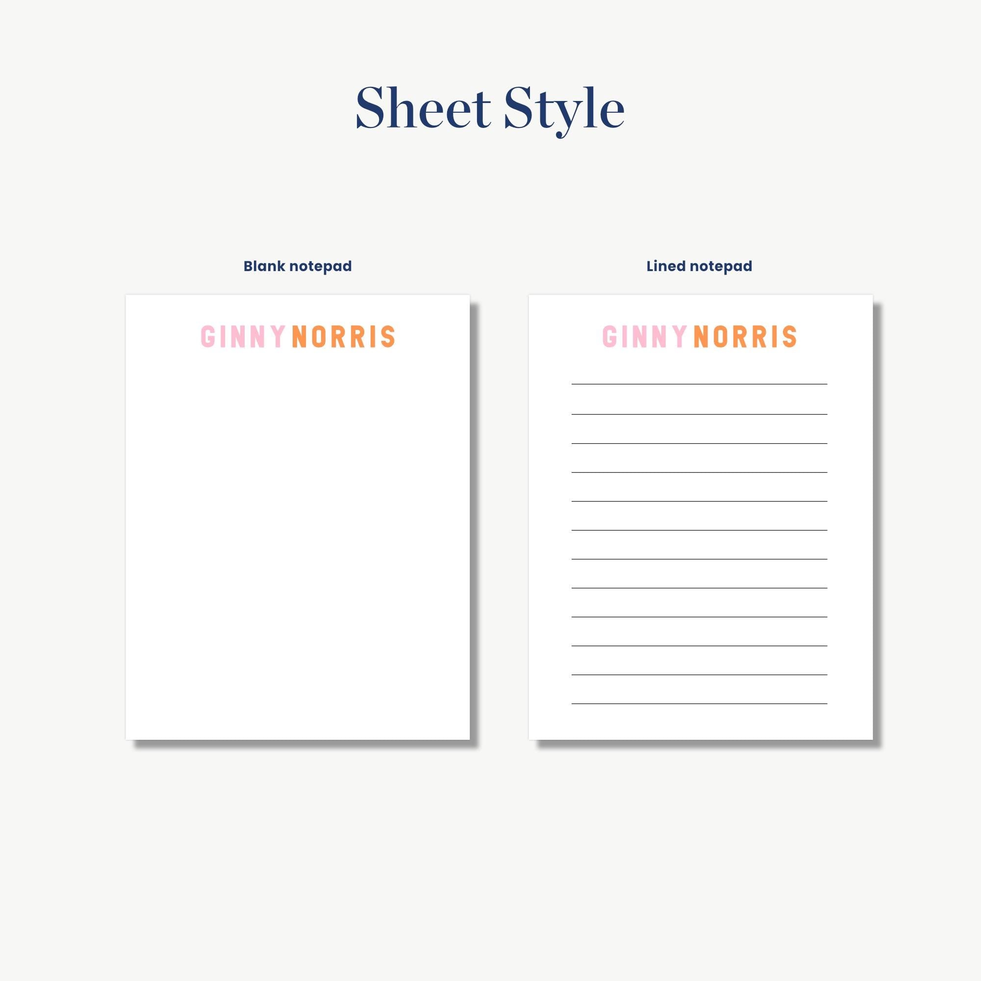 two blank notepads with the name 'GINNY NORRIS' printed on them.