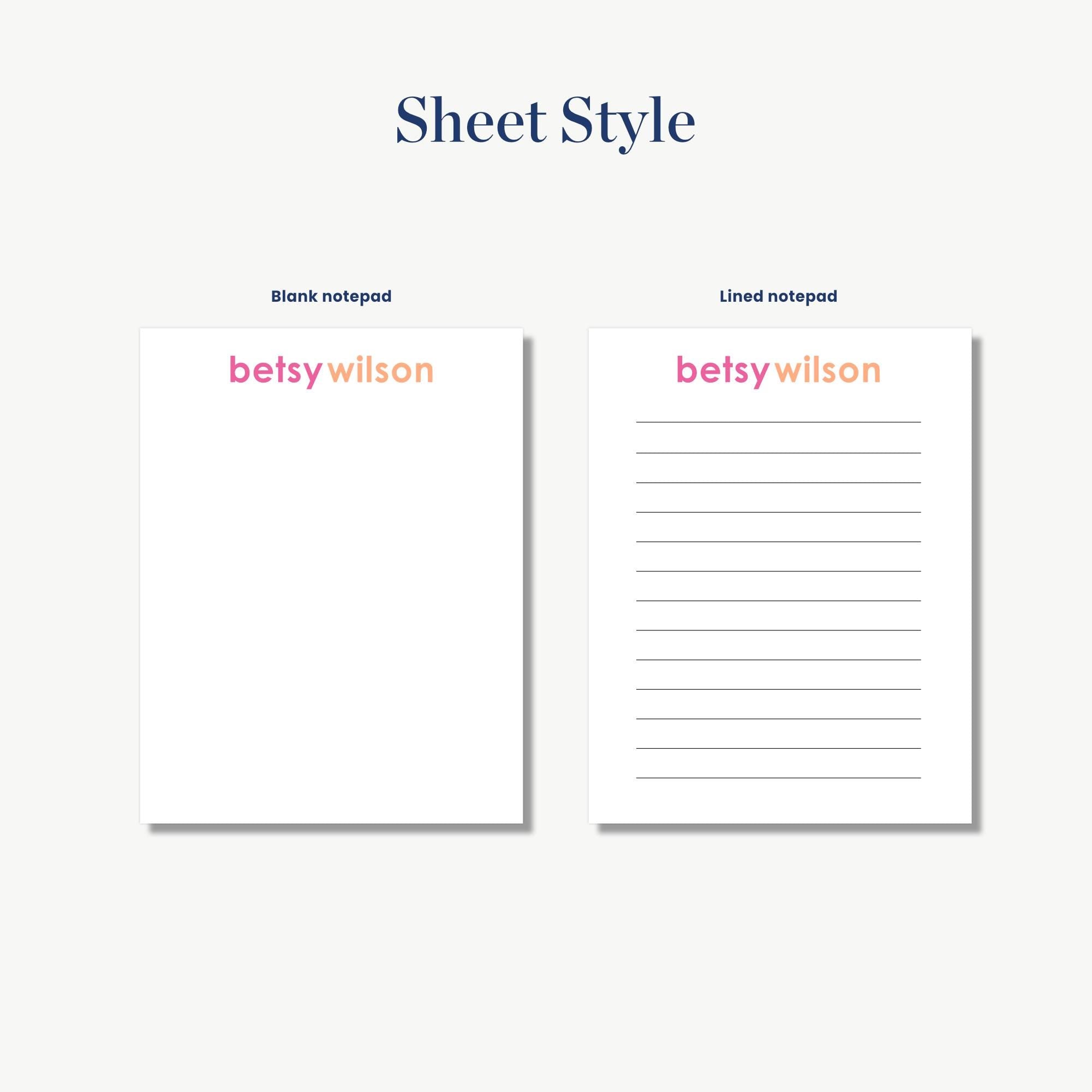two blank notepads with the name 'Betsy Wilson' printed on them.