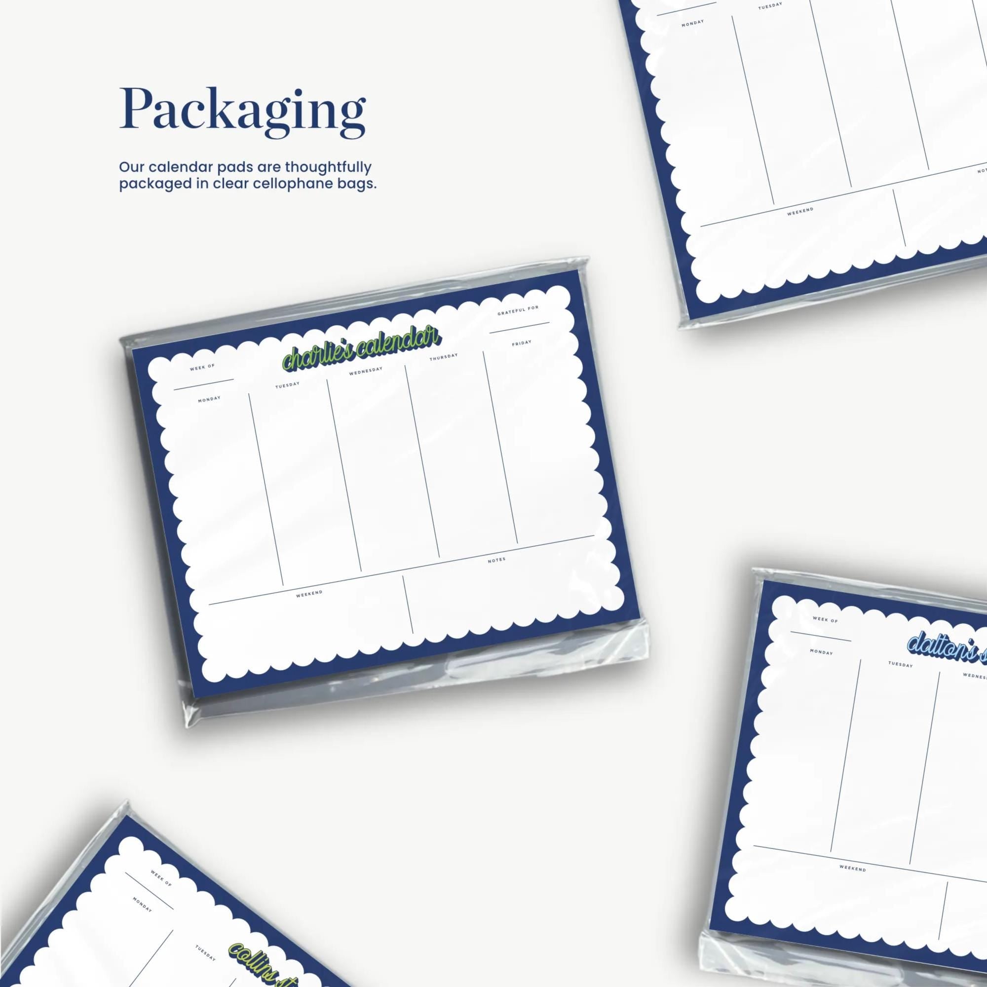 a collage of four calendar pads, each with a blue and white design and a grid layout. The pads are arranged in a way that they appear to be part of a larger collection or display.