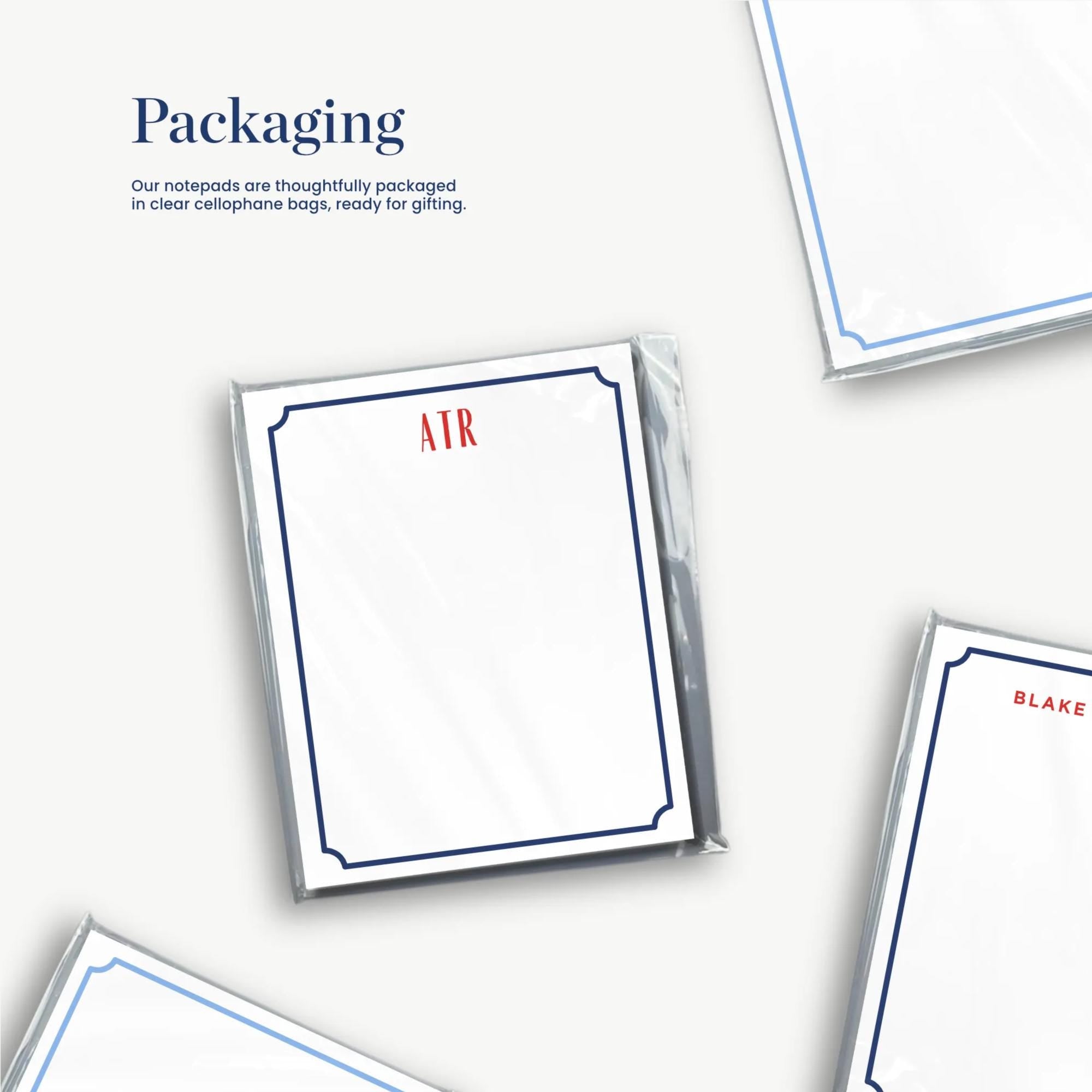 several blank cards or notepads with the word "Packaging" written on them, along with some text and logos.