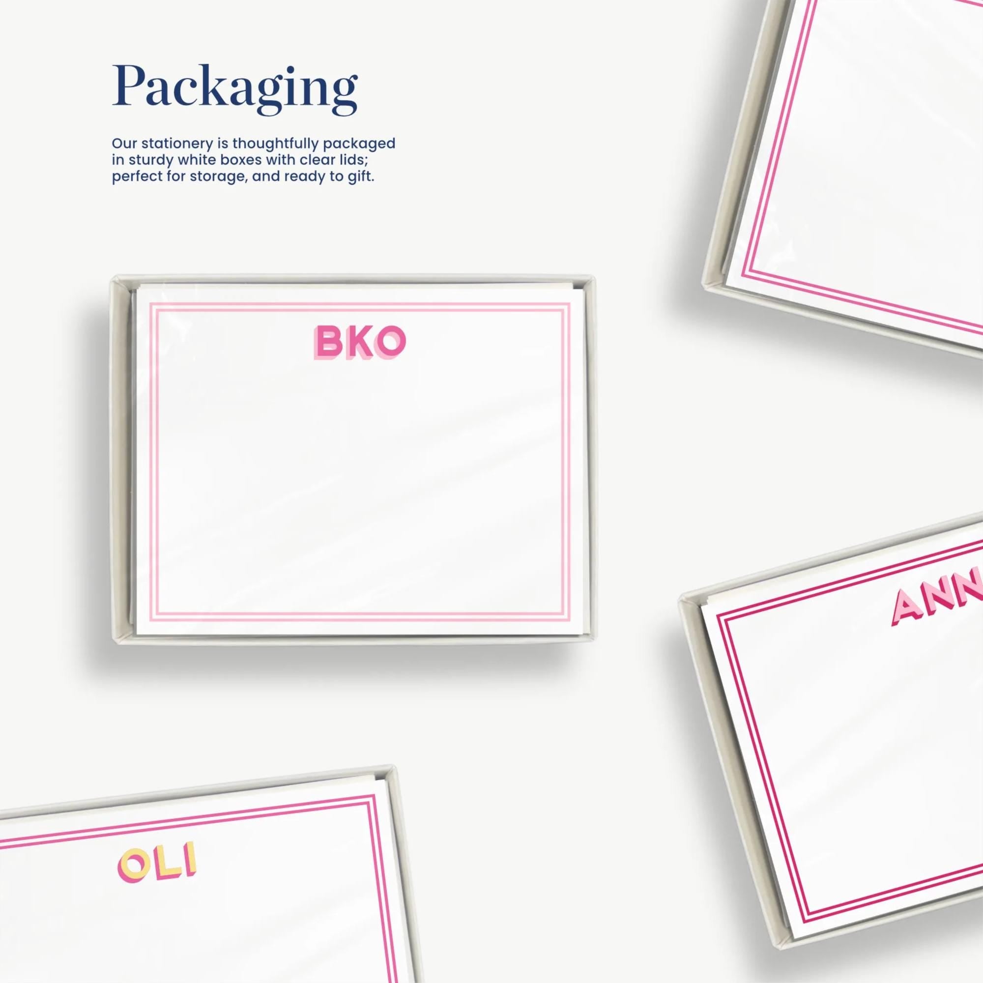 several blank cards with names written on them, along with some packaging materials.