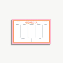 The image is a pink and white calendar or schedule organizer with the word "GEORGIA" prominently displayed. It appears to be a simple, functional design with a grid layout for organizing days and events.