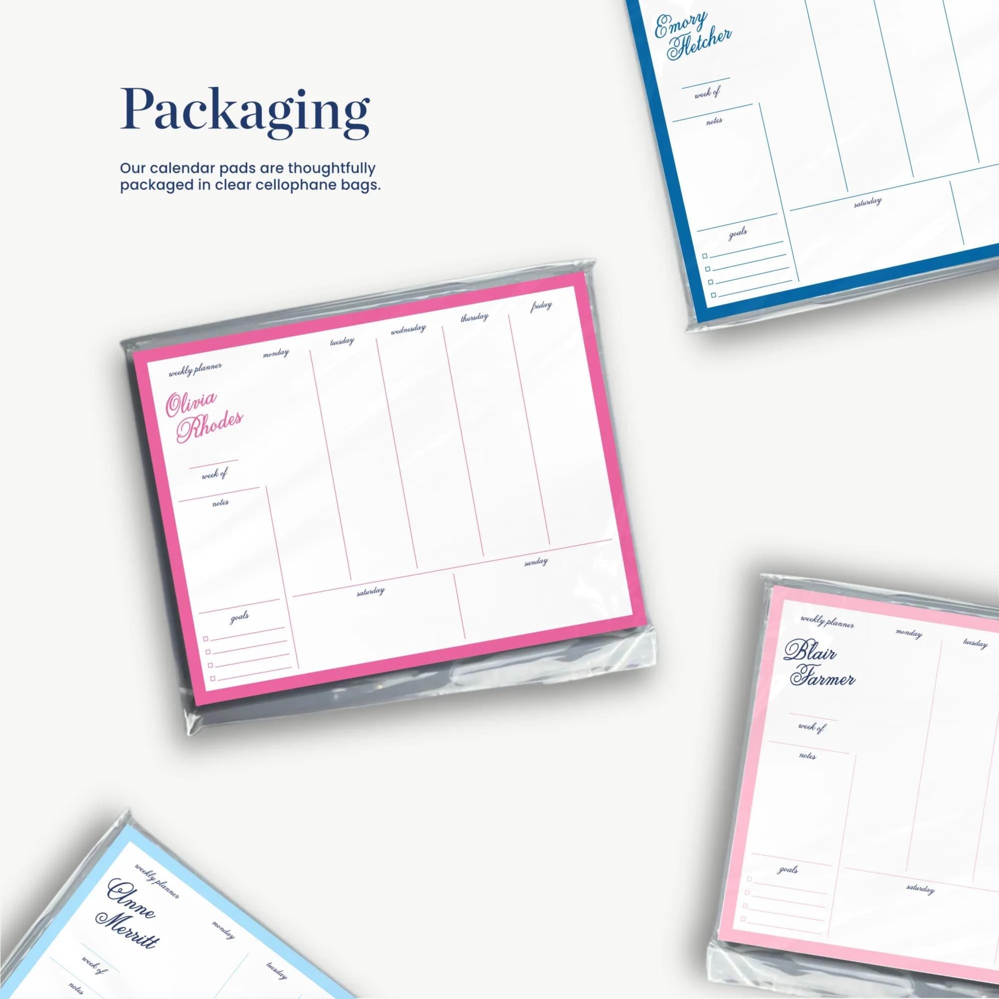 three different colored sticky notes or pads, each with a calendar-style layout, suggesting they are used for organizing tasks or events.