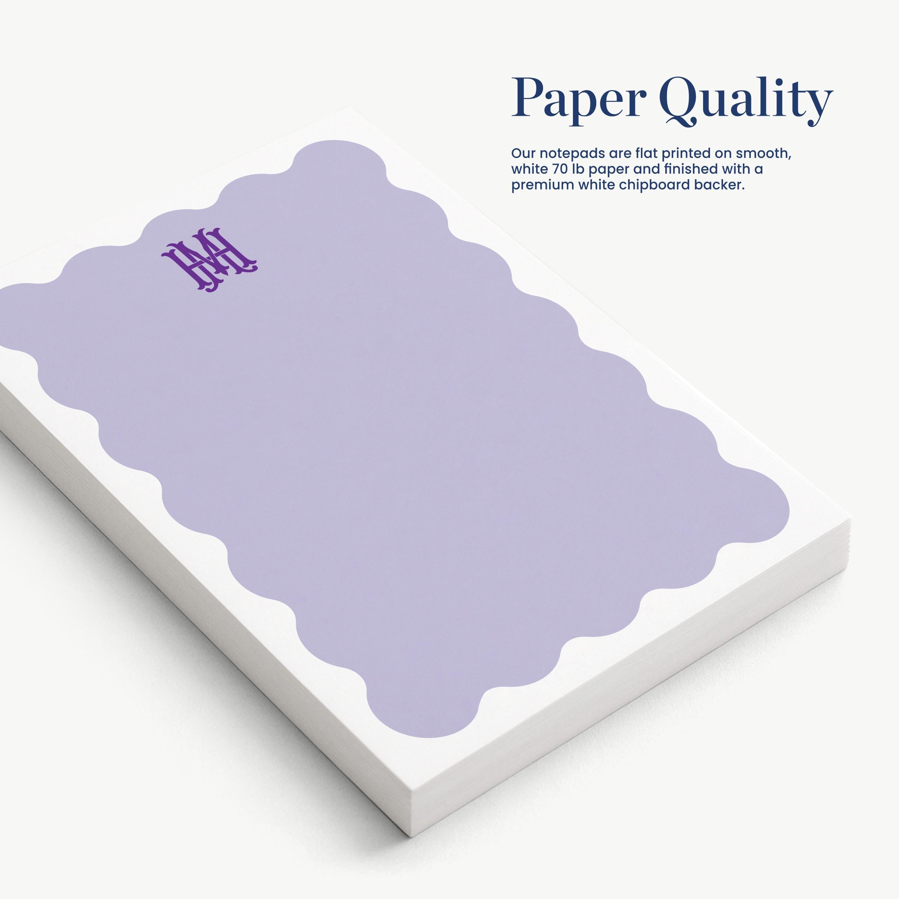 a set of purple notepads with a wavy border, and the text "Paper Quality" is displayed above them.