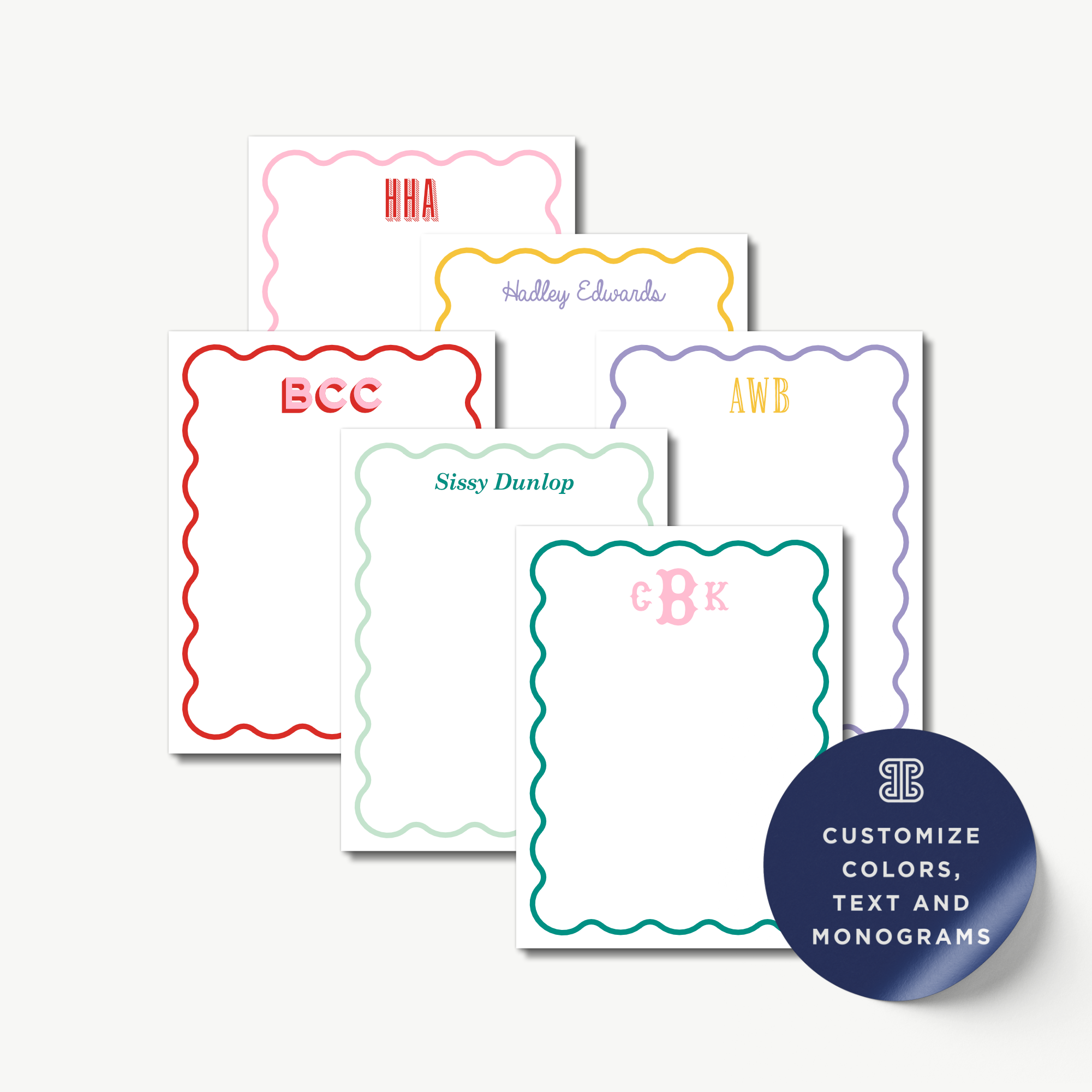 a collection of personalized stationery items, including name cards and monogrammed designs.