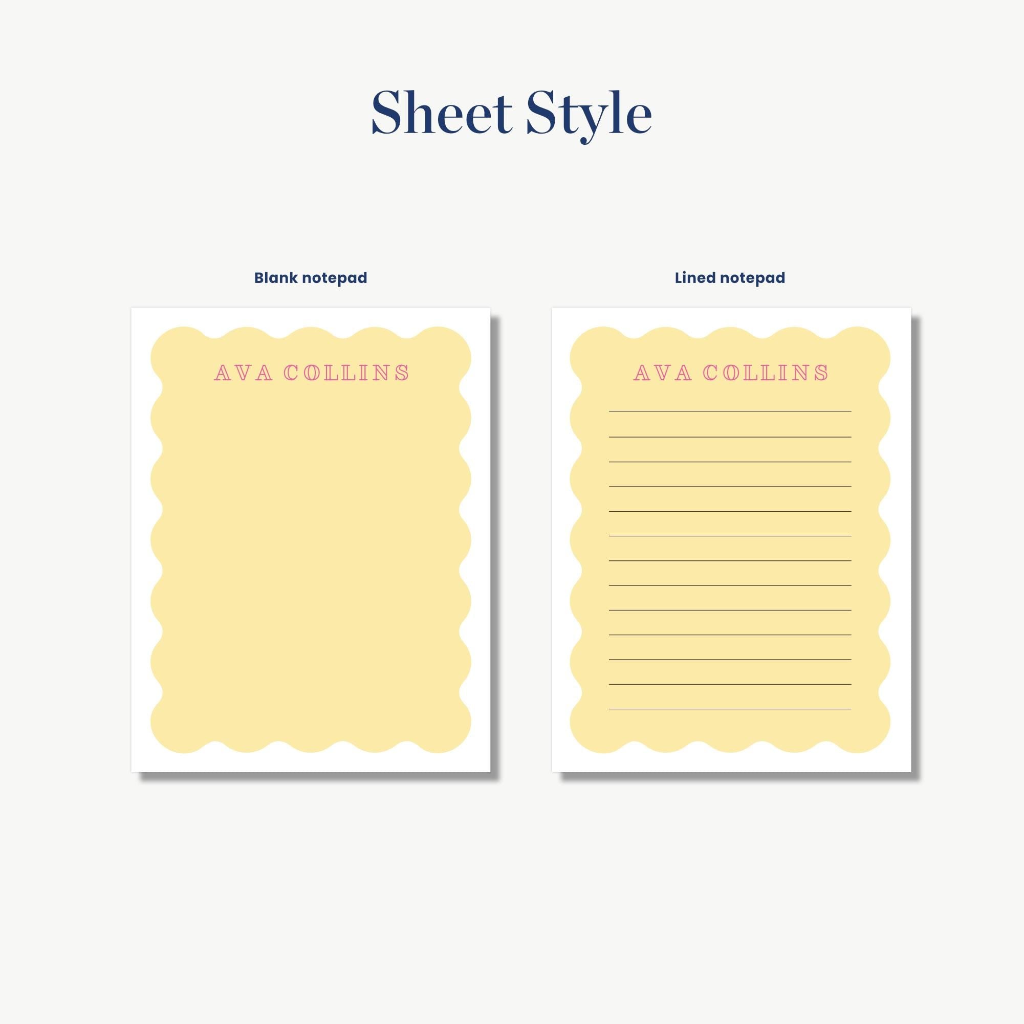 two blank notepads with a scalloped edge design, labeled "ava collins" in pink text.