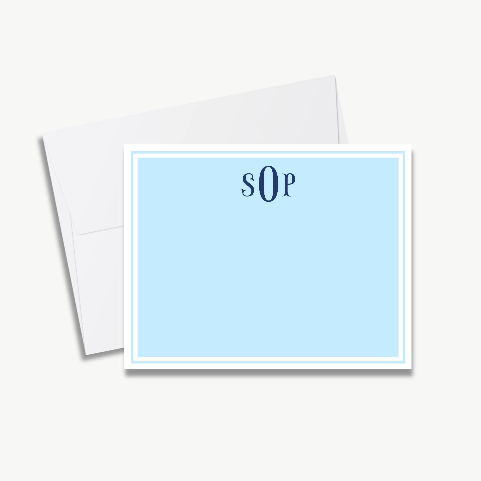 A white envelope with a blue card inside, featuring the initials "SOP" in the center.