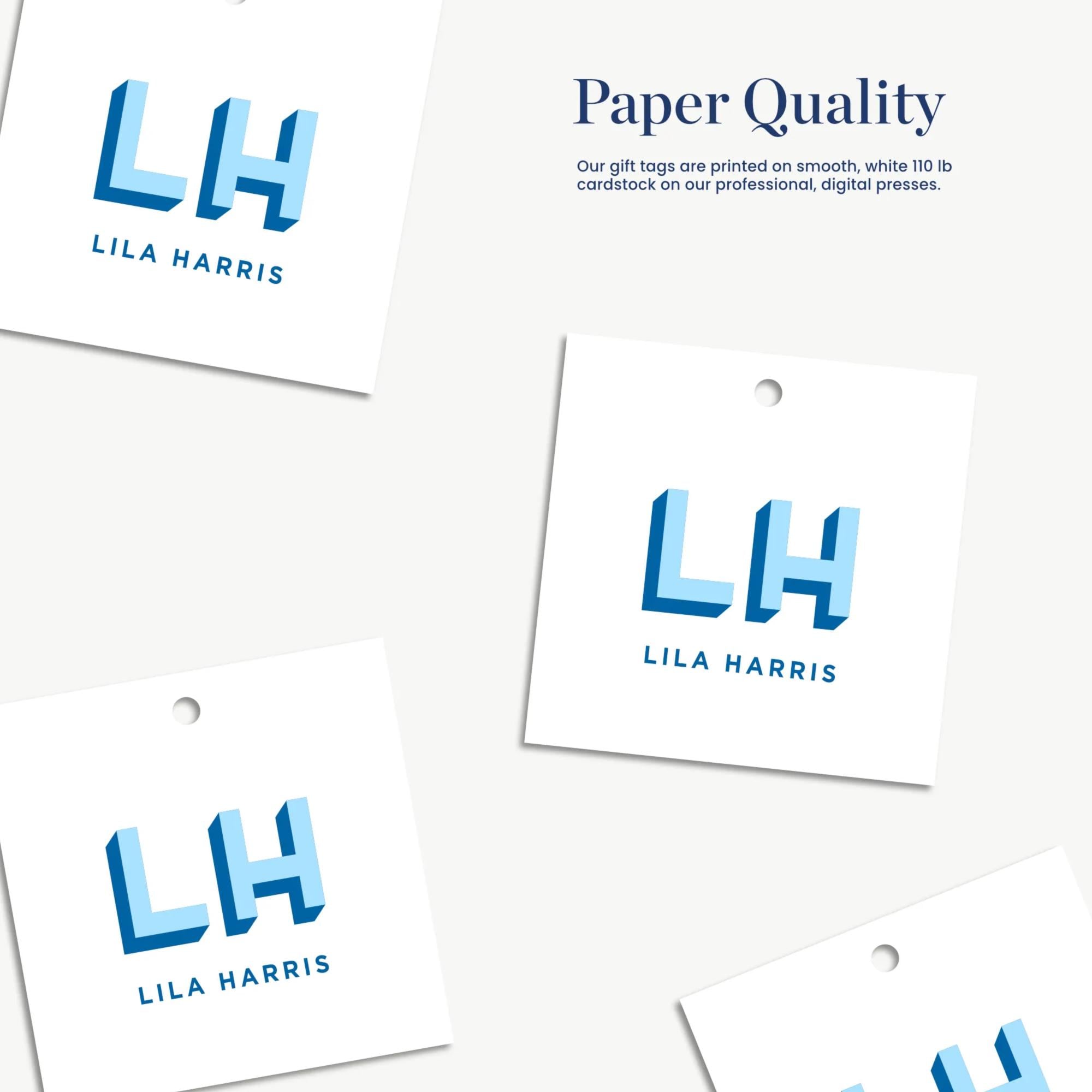 a collection of four paper tags, each featuring the same logo and text. The logo is a stylized letter "L" in a blue color, and the text below the logo reads "Lila Harris". The tags are arranged in a row, with the first one being the largest and the last one being the smallest. The tags are printed on smooth, white paper, and they are designed to be used as gift tags for a professional digital presentation.