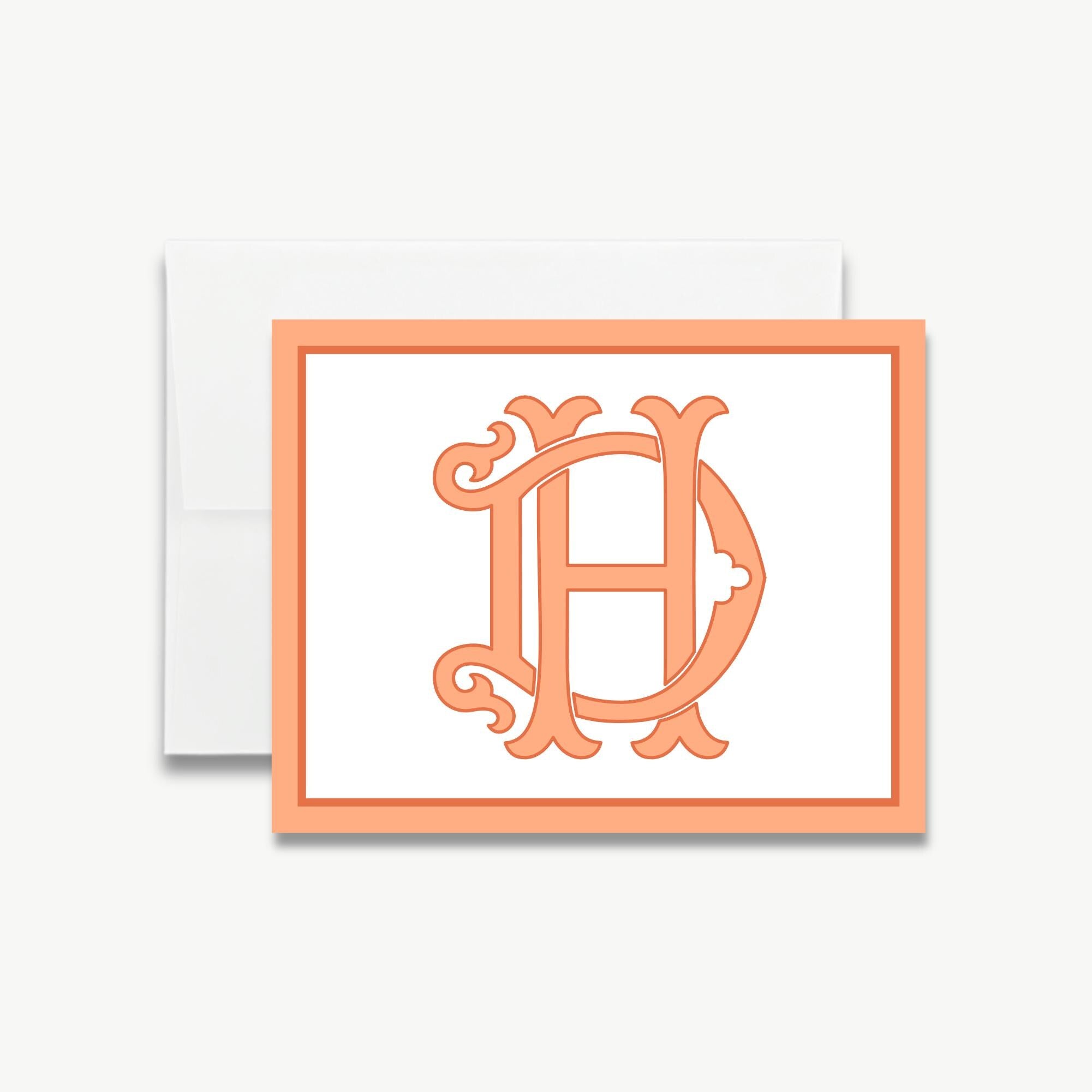 a card with a decorative monogram of the letters 'D H' in an ornate style.