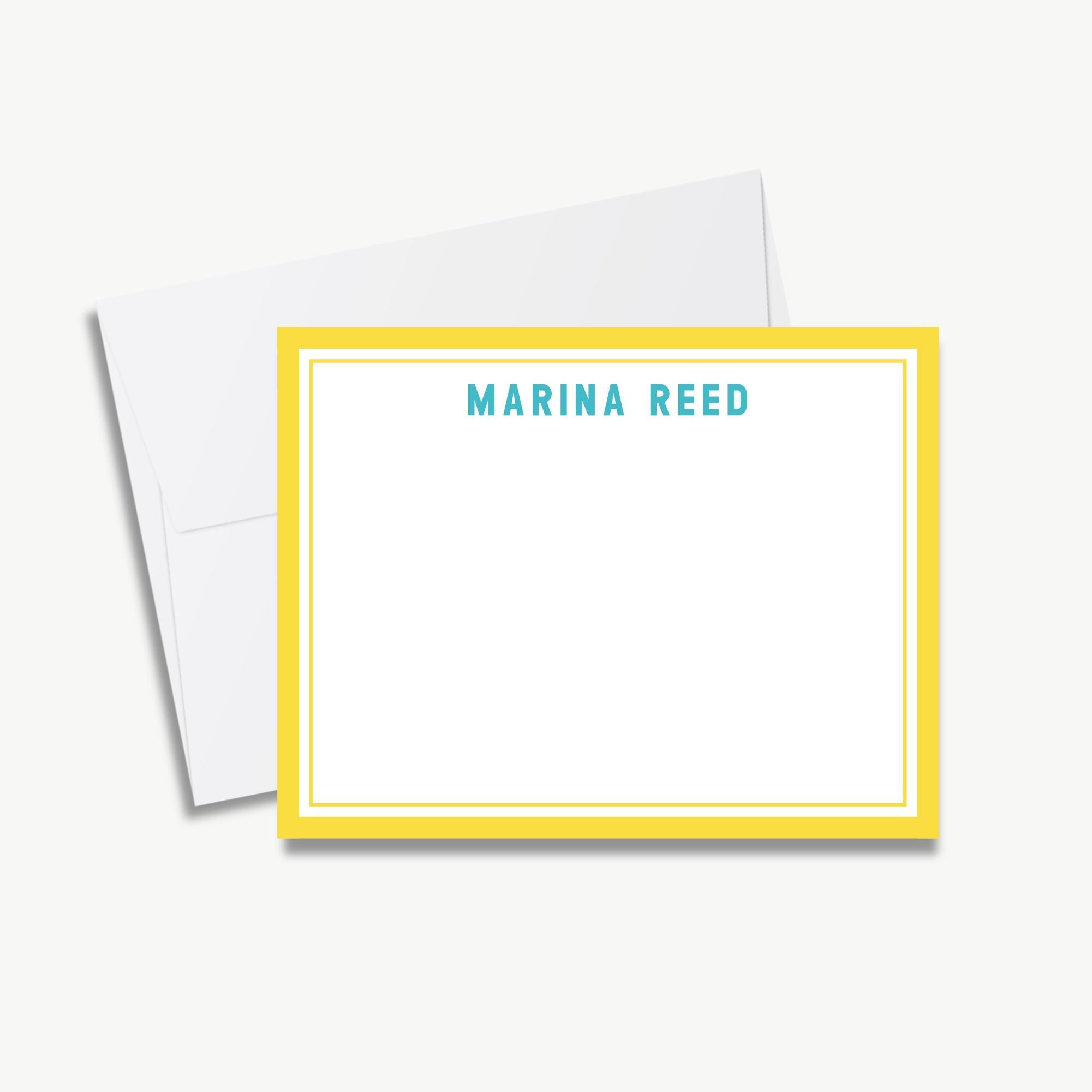 a white envelope with a yellow border, and a blank white card with the name "MARINA REED" printed on it.