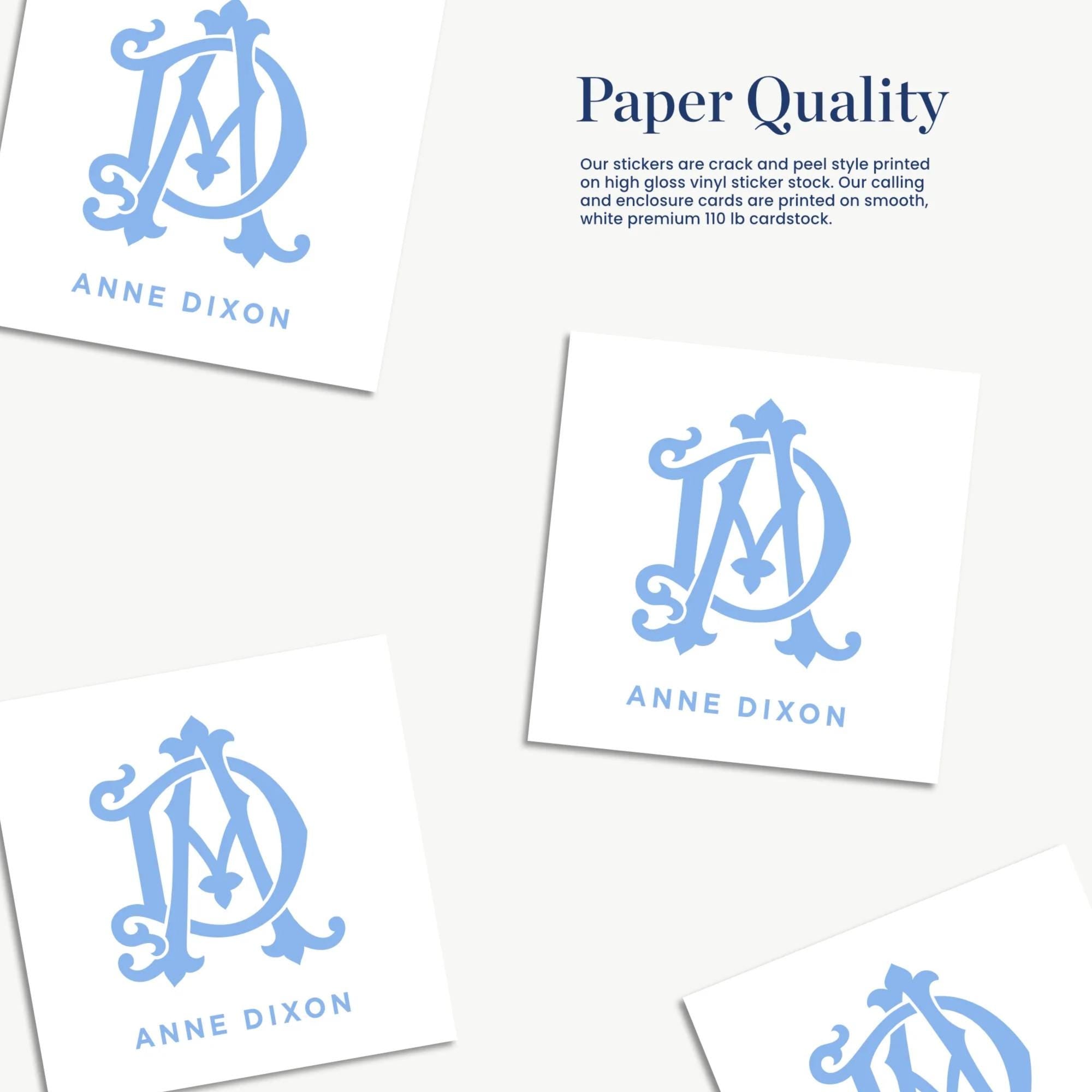 a collection of four identical paper stickers with the initials "ANNE DIXON" printed on them.