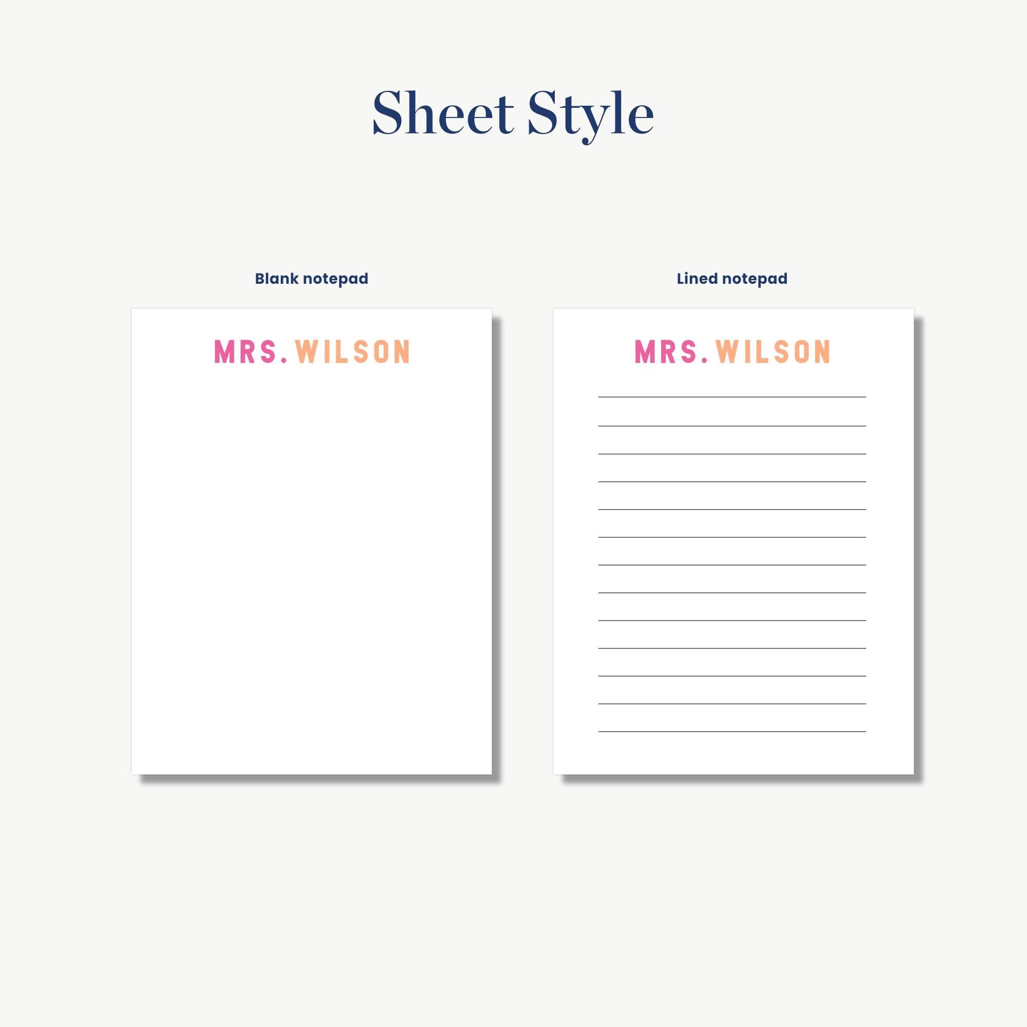 two blank notepads with the name 'Mrs. Wilson' printed on them.