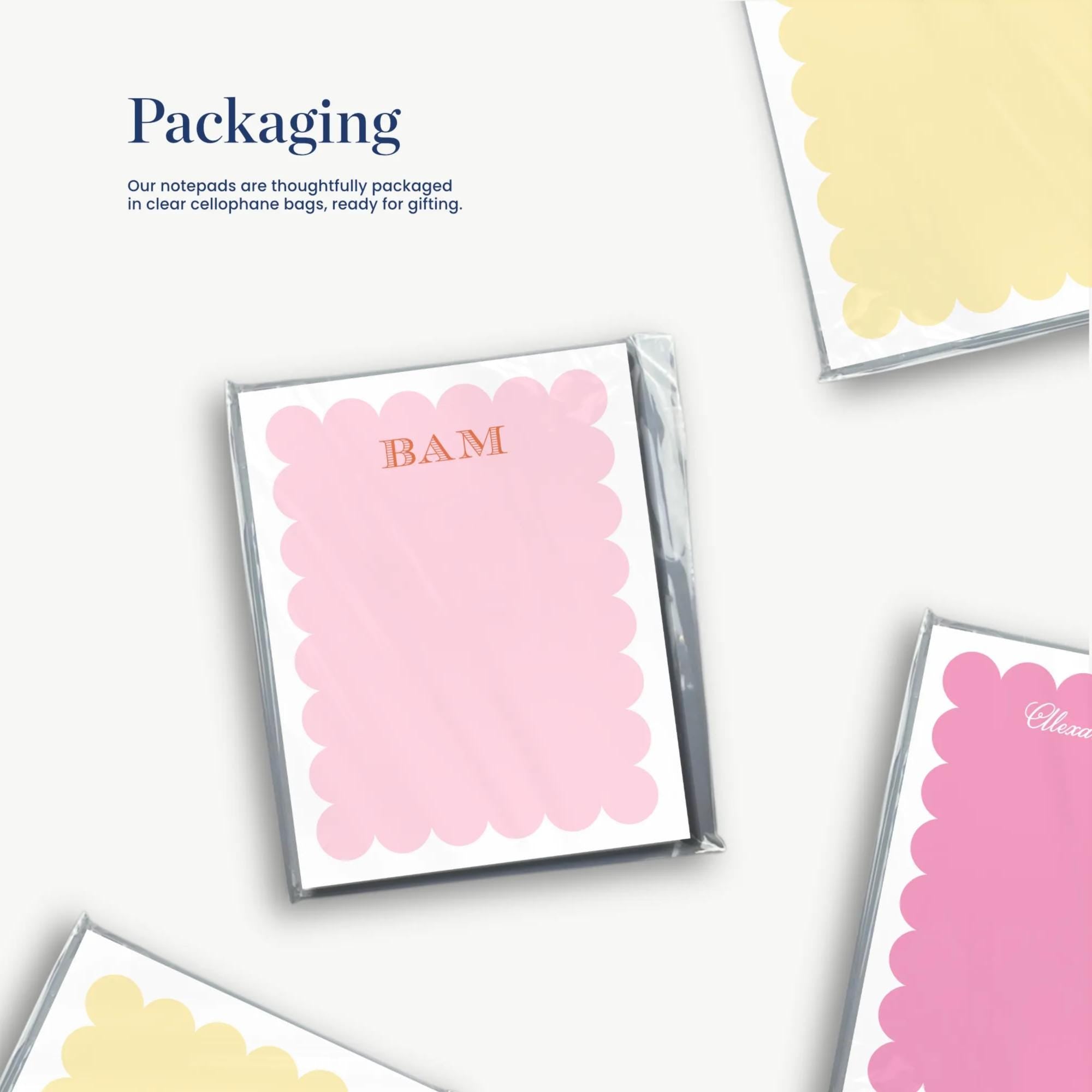 various pink and yellow shapes, which appear to be decorative elements or packaging materials.