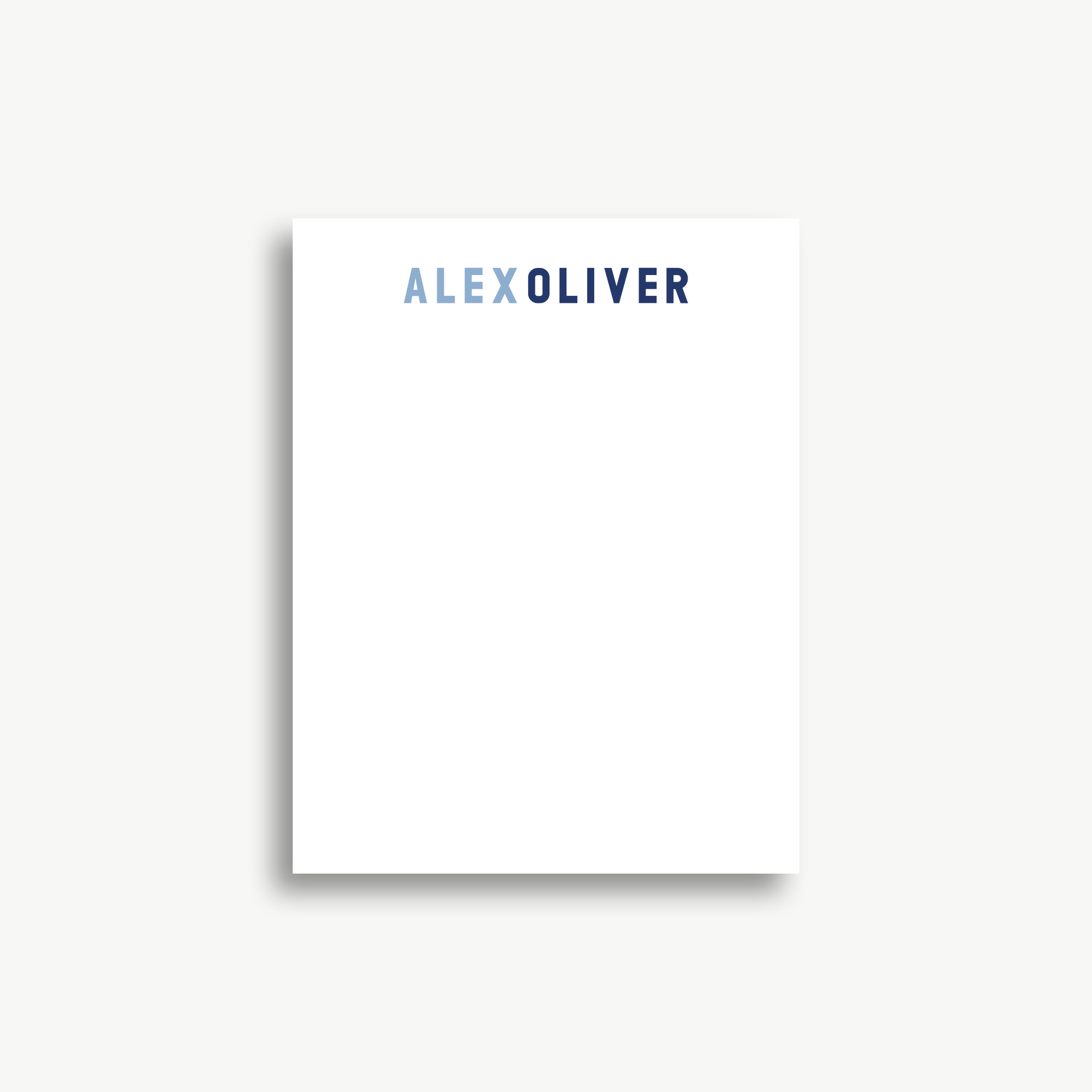 A white piece of paper with the word "ALEXOLIVER" printed on it.