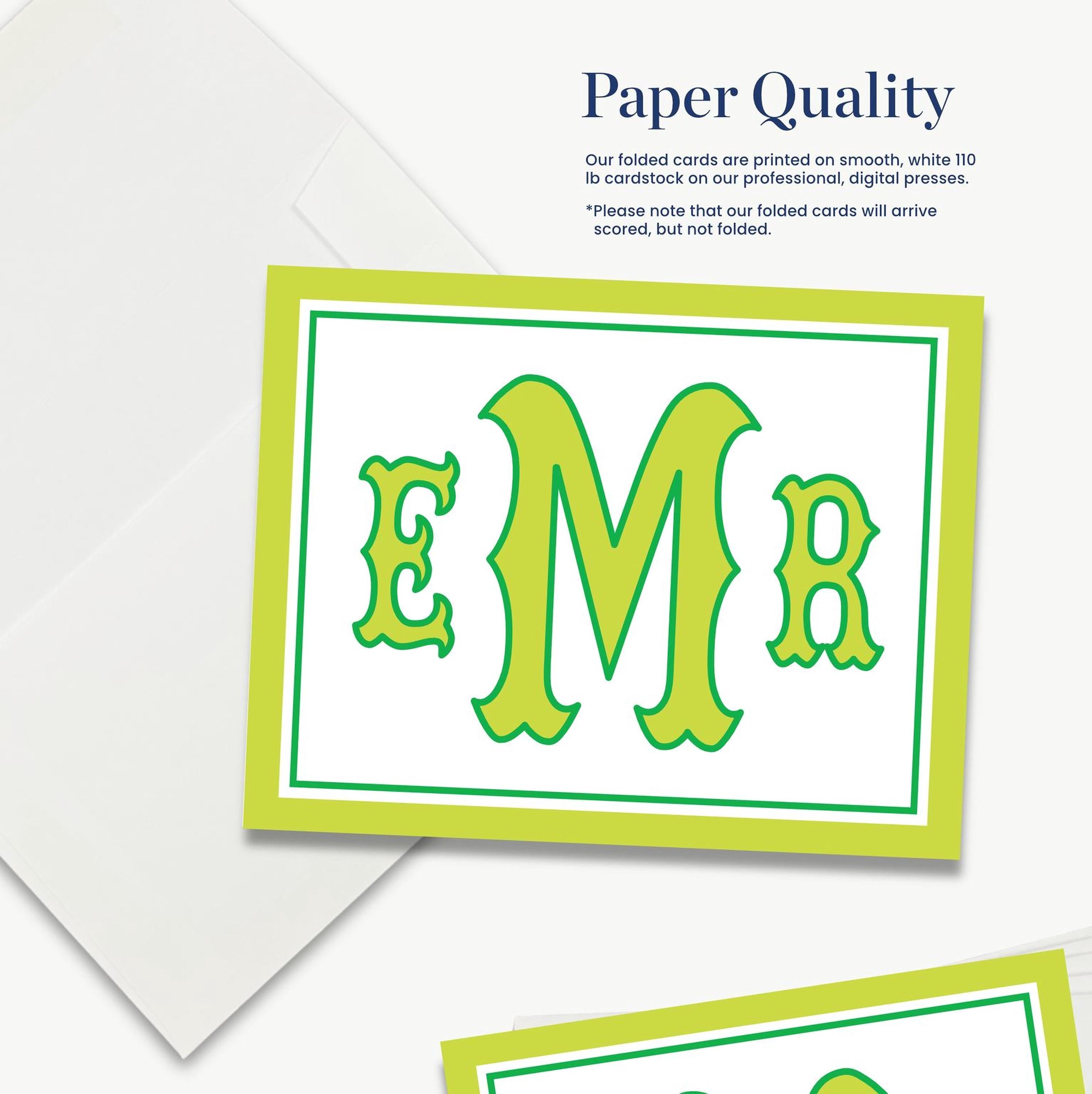 The image is a close-up of a folded card with a green border and the letters "EMR" printed on it.