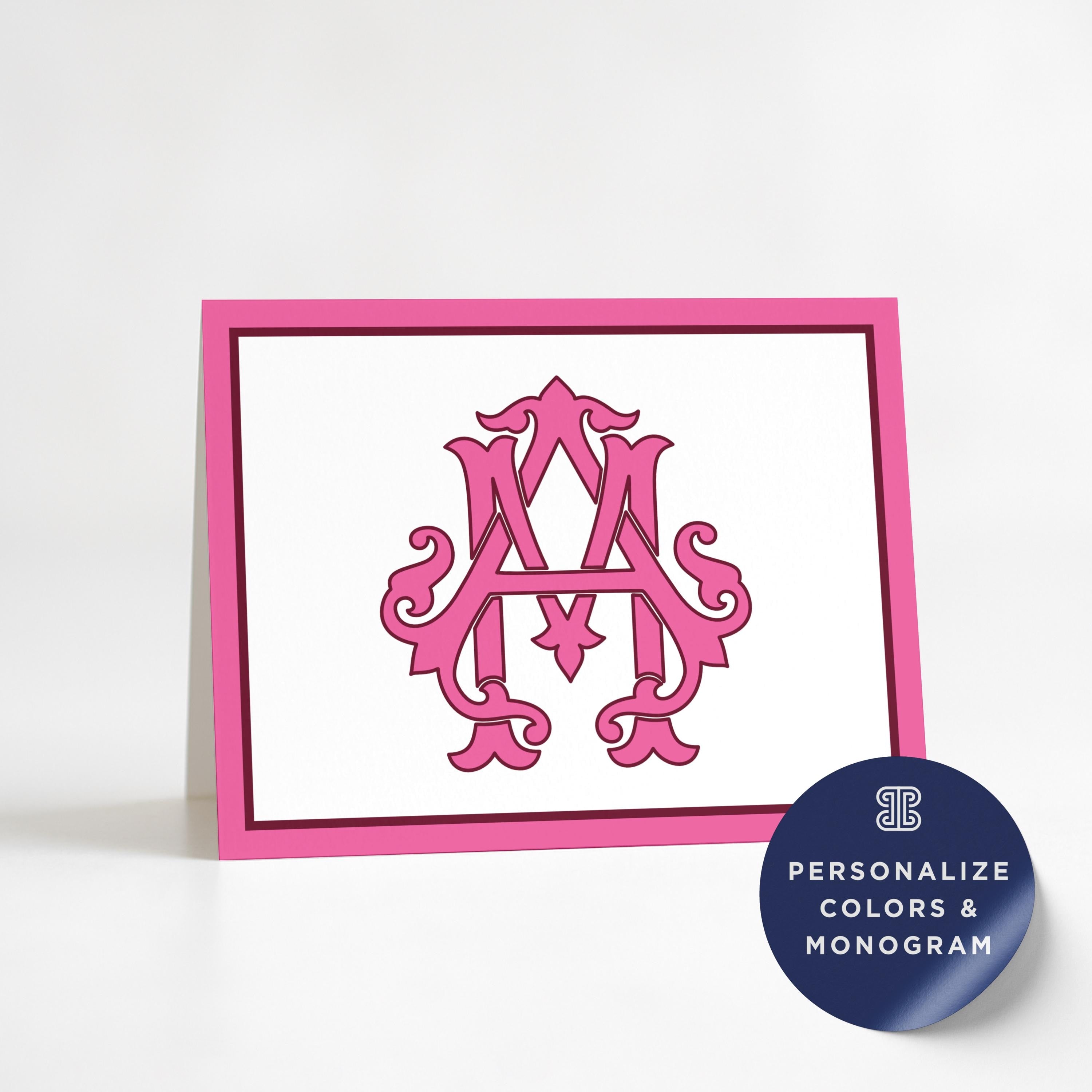 a pink monogrammed letter "A" on a white background, framed in a pink border.